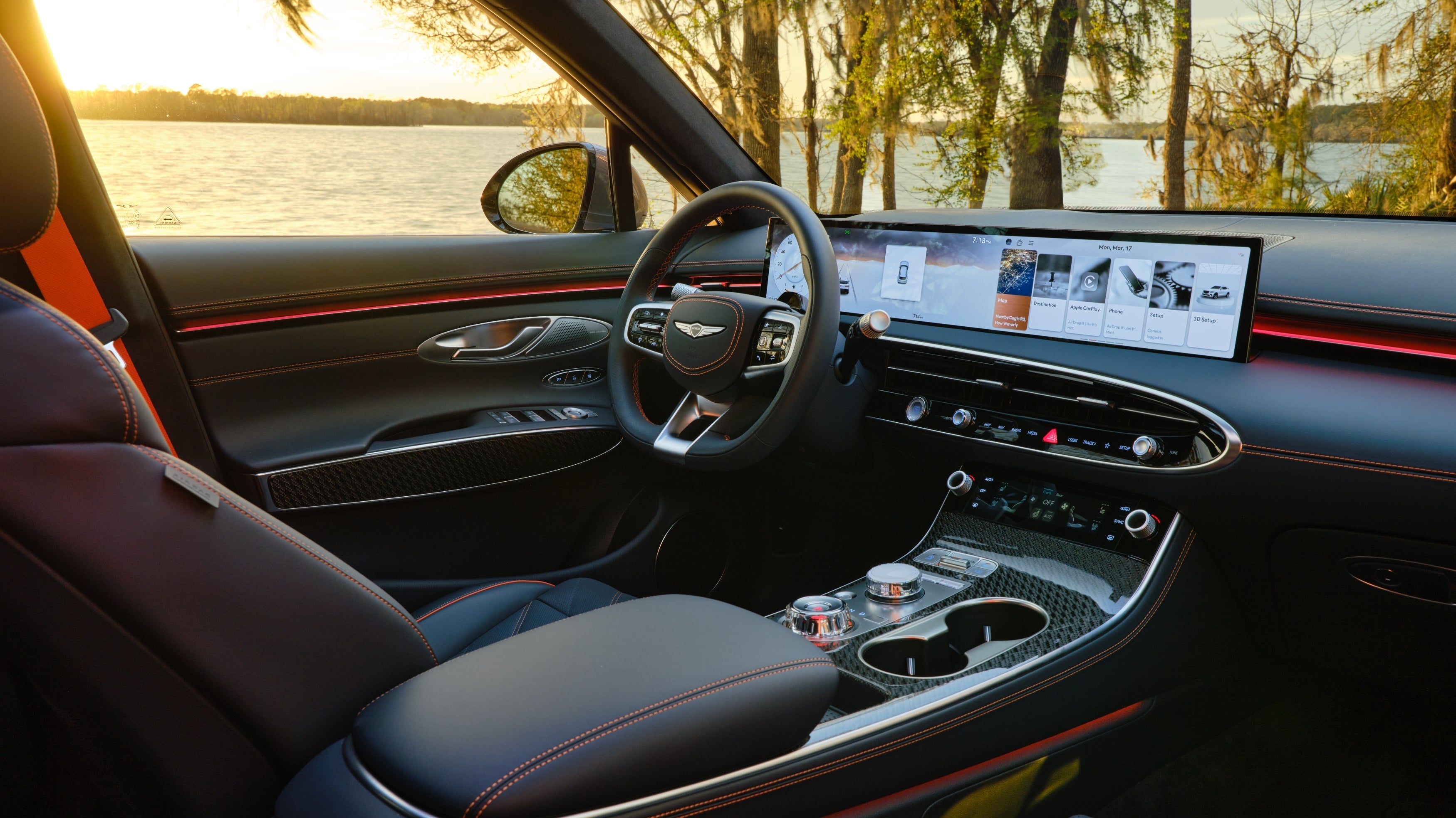 The obsidian black interior is seen in its entirety looking in from the back passenger window of the 2026 Genesis GV70 in Phoenix.
