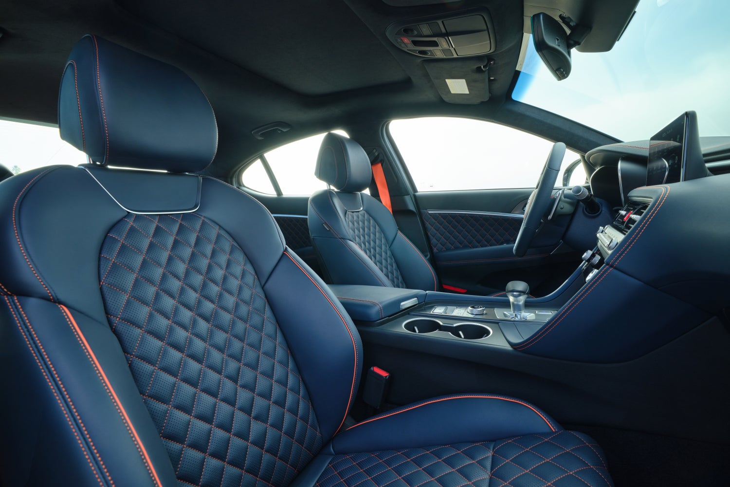 The modern leather interior of the Prestige Graphite 2026 Genesis G70 in Chandler is shown.