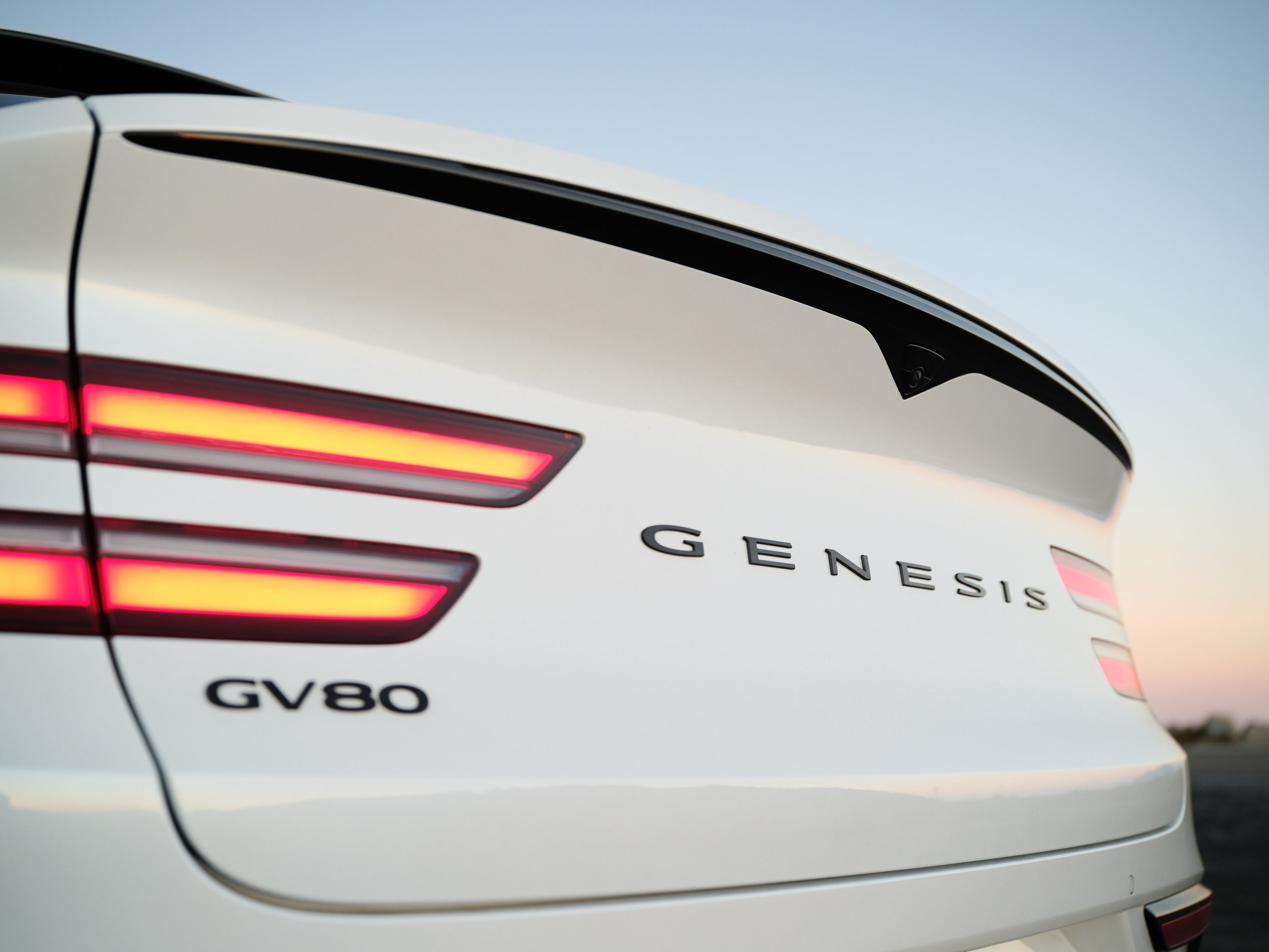 A closeup shot of the Genesis name on the back of the new GV80 Coupe in Phoenix.